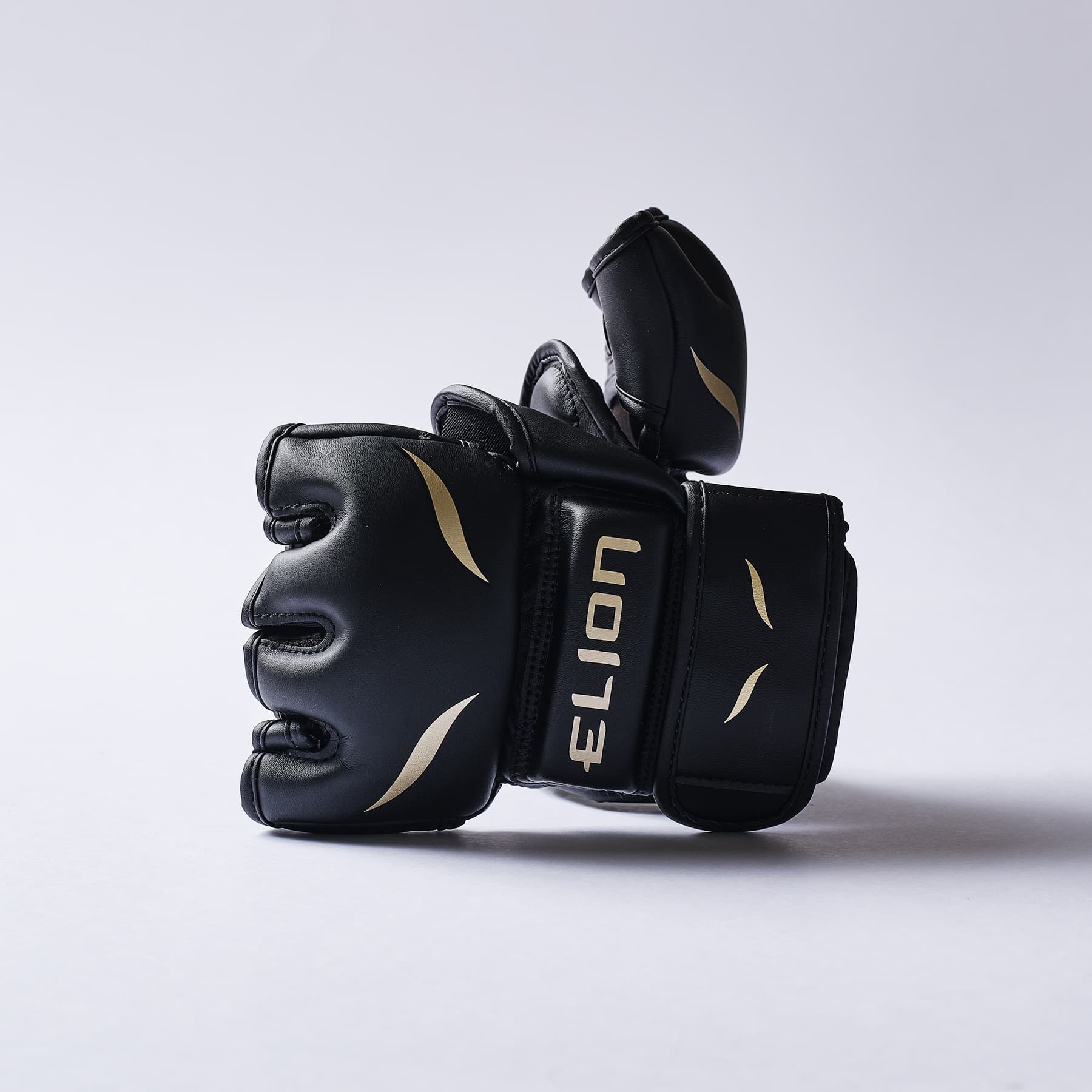 Gants MMA ELION Uncage 10ème Anniversaire - Noir/Or - Image 2