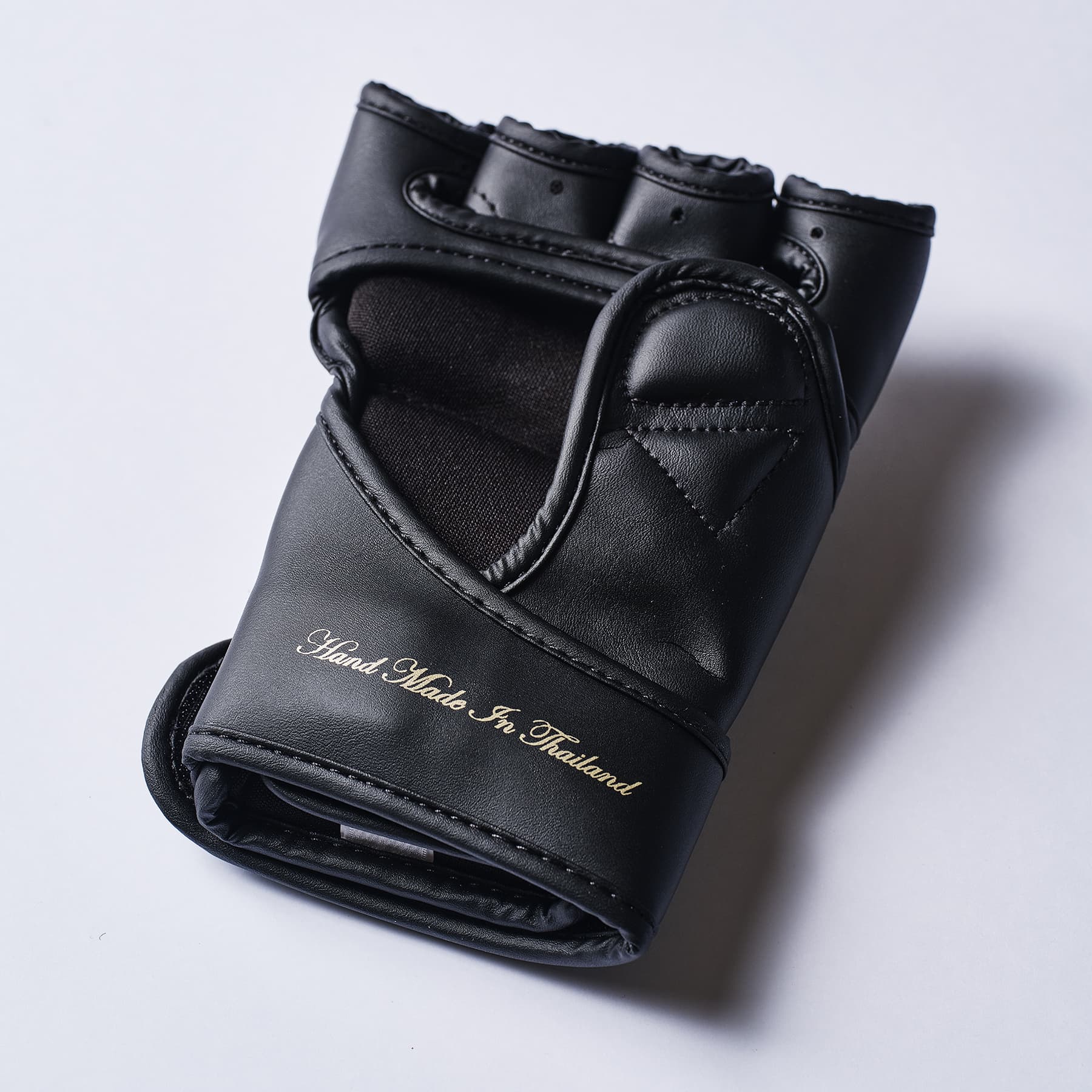 Gants MMA ELION Uncage 10ème Anniversaire - Noir/Or - Image 5